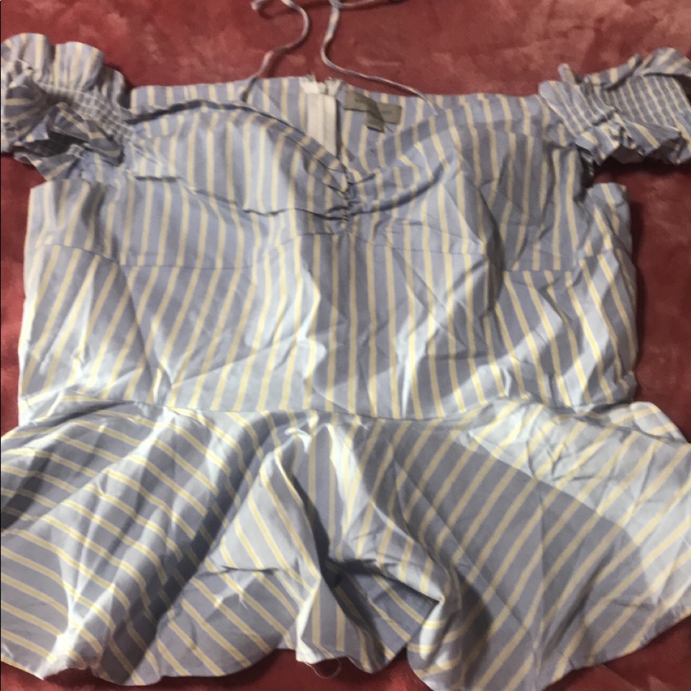 Peplum yellow, white, and blue stripped top.